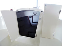 The companionway doors are mounted on take-apart hinges so that they can be removed.