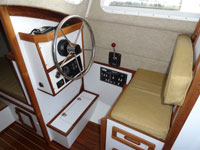 Helm inside the pilothouse allows for comfortable steering, even when it's raining