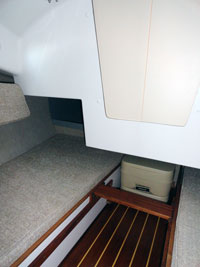 Portable head stores out of the way under the cockpit floor