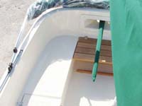 Gas tank storage in cockpit under teak platform